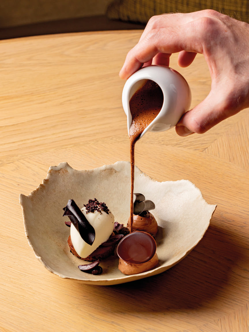 Maze Row Voices Pioneers of the Plate Article a chocolate desert of Vibrato, from Guatemala and Madagascar, Manni olive oil and Kalamata olive at Hélène Darroze at The Connaught